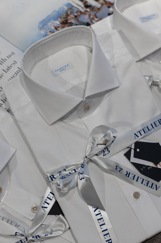 White Italian cotton shirts tied with ATELIER 23 ribbon as Christmas gifts
