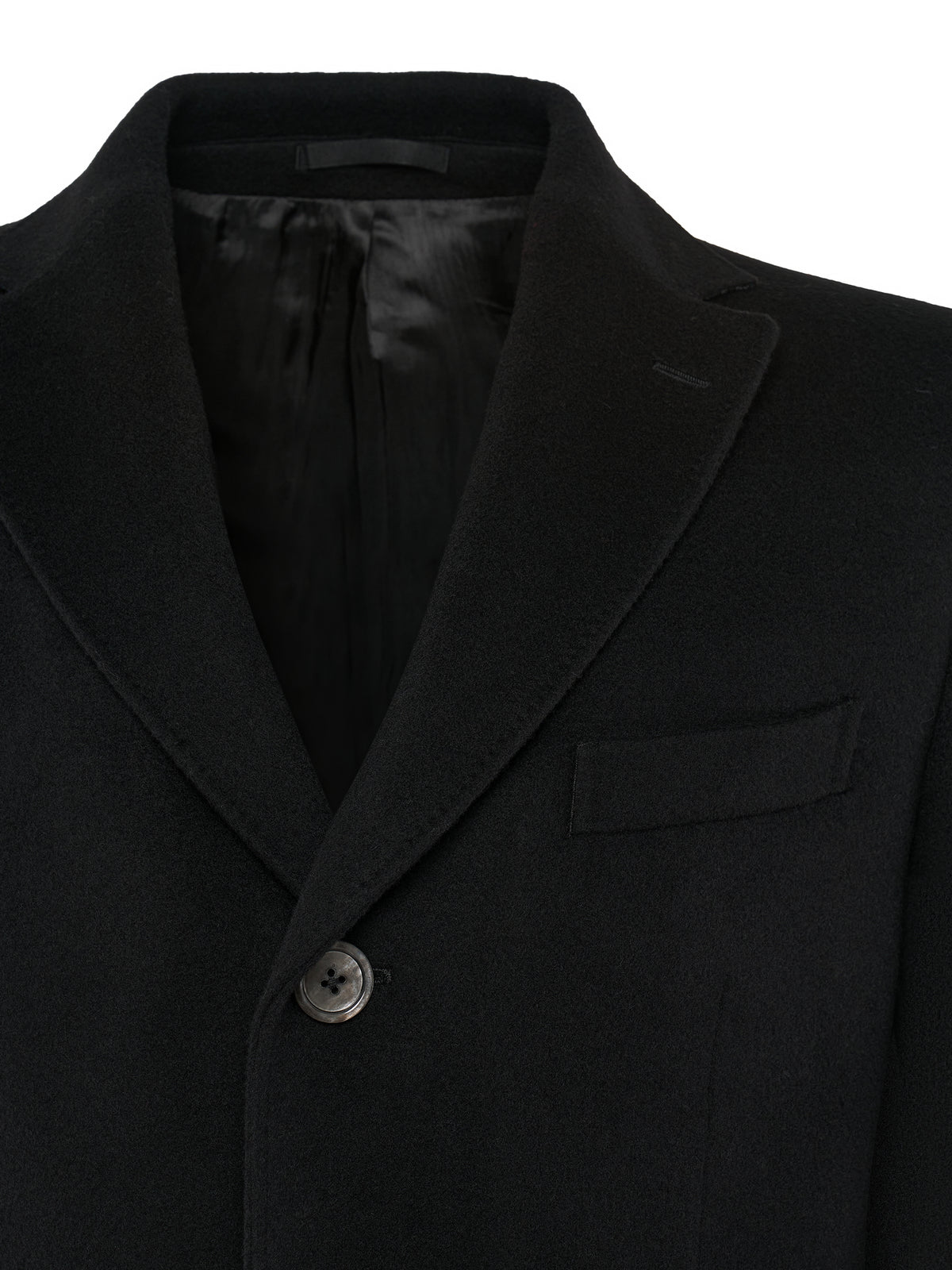 Notch lapel and chest pocket of the black wool and cashmere overcoat