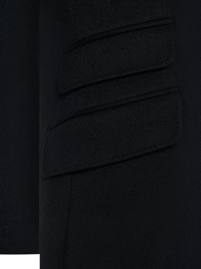 Flap pocket and ticket pocket on the black overcoat