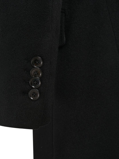 Four-button cuff of the black wool and cashmere overcoat