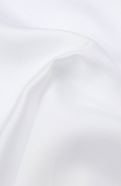 Close-up of the white silk twill of the ATELIER 23 pocket square