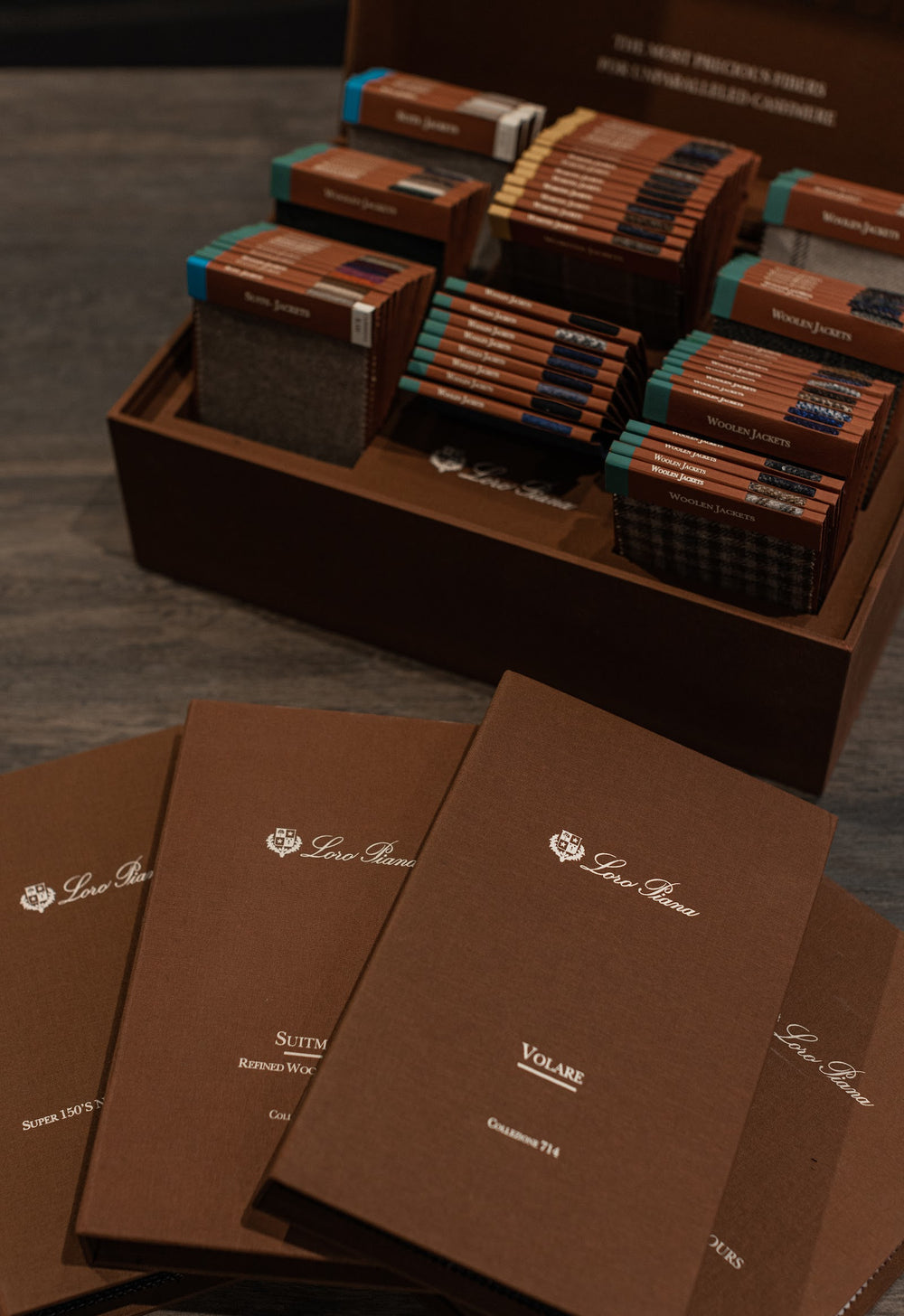 Box of Loro Piana cloth books