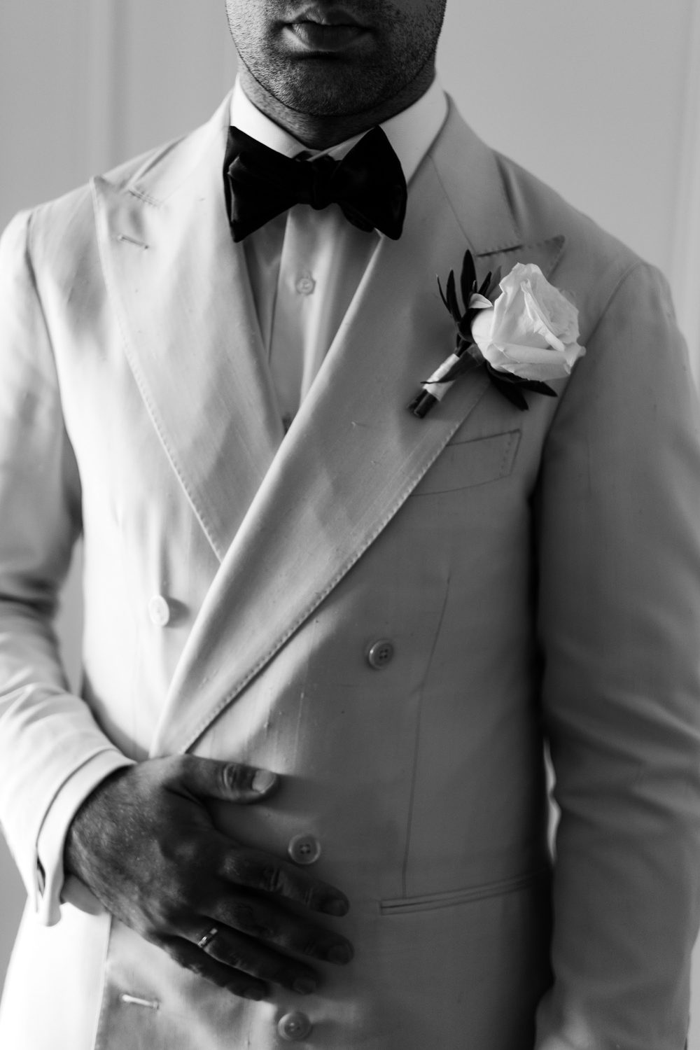 Double-breasted lapel with a white rose
